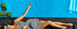 Girl in bathing suit near pool